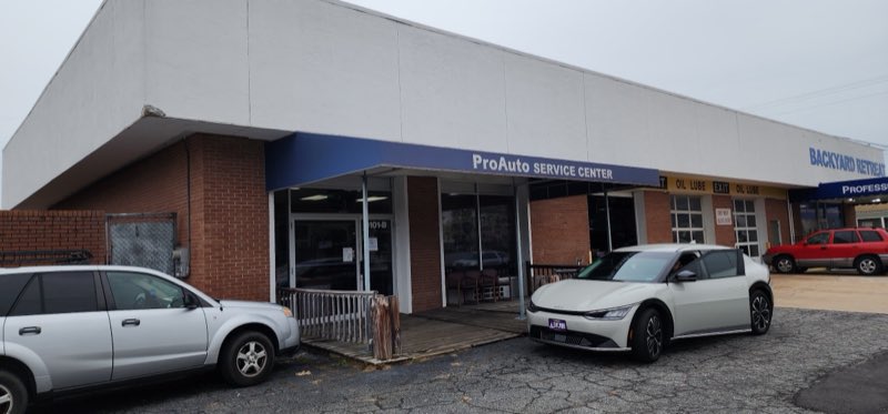 ProAuto Service Center shop front and customer lounge